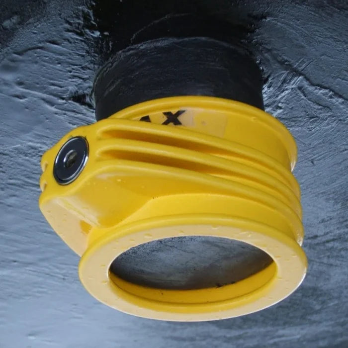 Yellow Trimax TFW60 Lock Secured on RV King Pin - Bottom View | United RV Parts