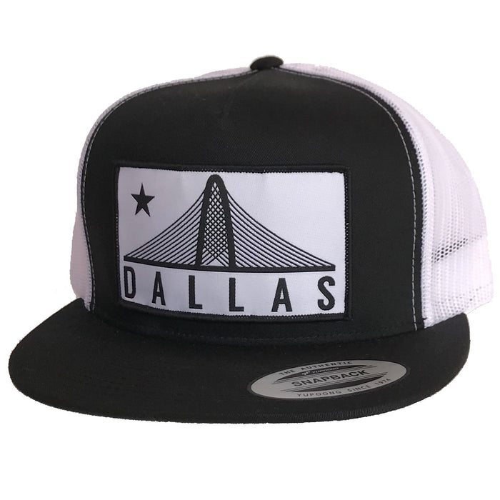 Trinity Dallas Patched Flat Bill Hat in black and white, showcasing a stylish design that embodies Dallas spirit. A must-have for anyone seeking Texas Made Gifts or memorable Texas souvenirs.