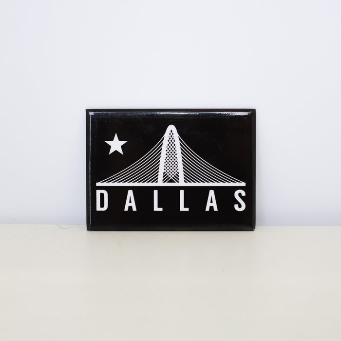 Rectangular, black magnet with Trinity design.