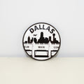 Circular, black and white magnet with Triple Underpass design.