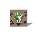 Truck Yard Frogs Enamel Pin featuring two playful frogs in vibrant colors, ideal as a unique Texas themed gift. Perfect for souvenirs from Texas, this 1.25-inch tall pin is a great choice for Dallas souvenirs and Texan gifts.