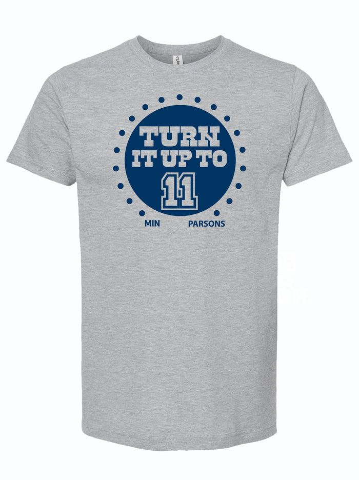 Gray T-shirt featuring the phrase 'Turn It Up to 11' in bold blue text, perfect for fans and enthusiasts. A great Texas themed gift that celebrates Texan culture, this shirt makes for an ideal souvenir from Texas, especially for those in Dallas. It's a stylish and comfortable choice among Texas Made Gifts.