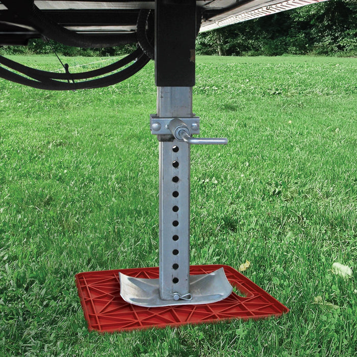 Valterra StayPut Red RV Stabilizer Jack Pad Under Trailer Jack on Grass - In-Use | United RV Parts