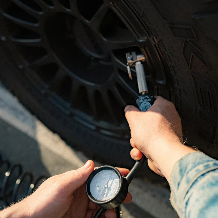 Viair 300P RVS Inline 150 PSI Gauge Attached to RV Tire Valve - Close-Up Detail | United RV Parts